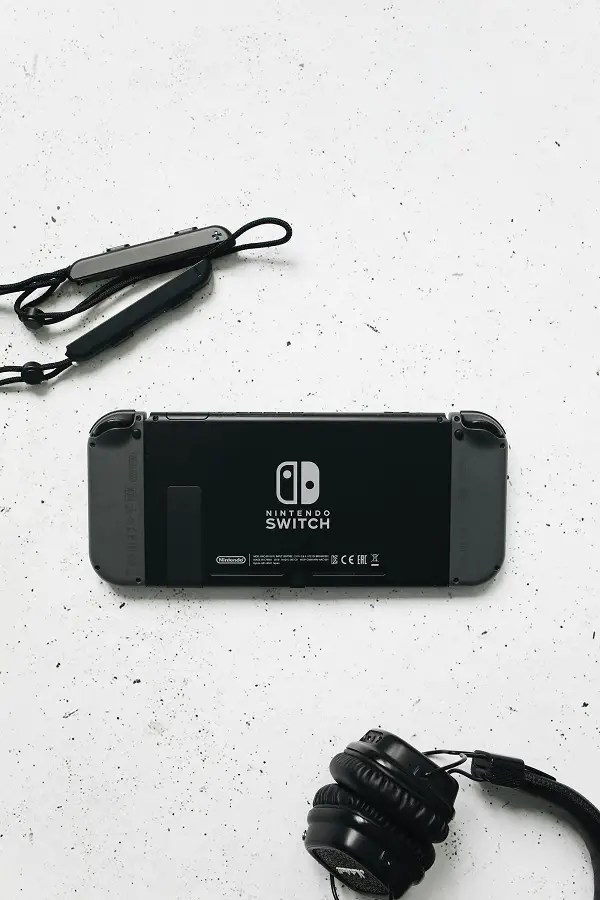 Nintendo Switch and a Black Headphones